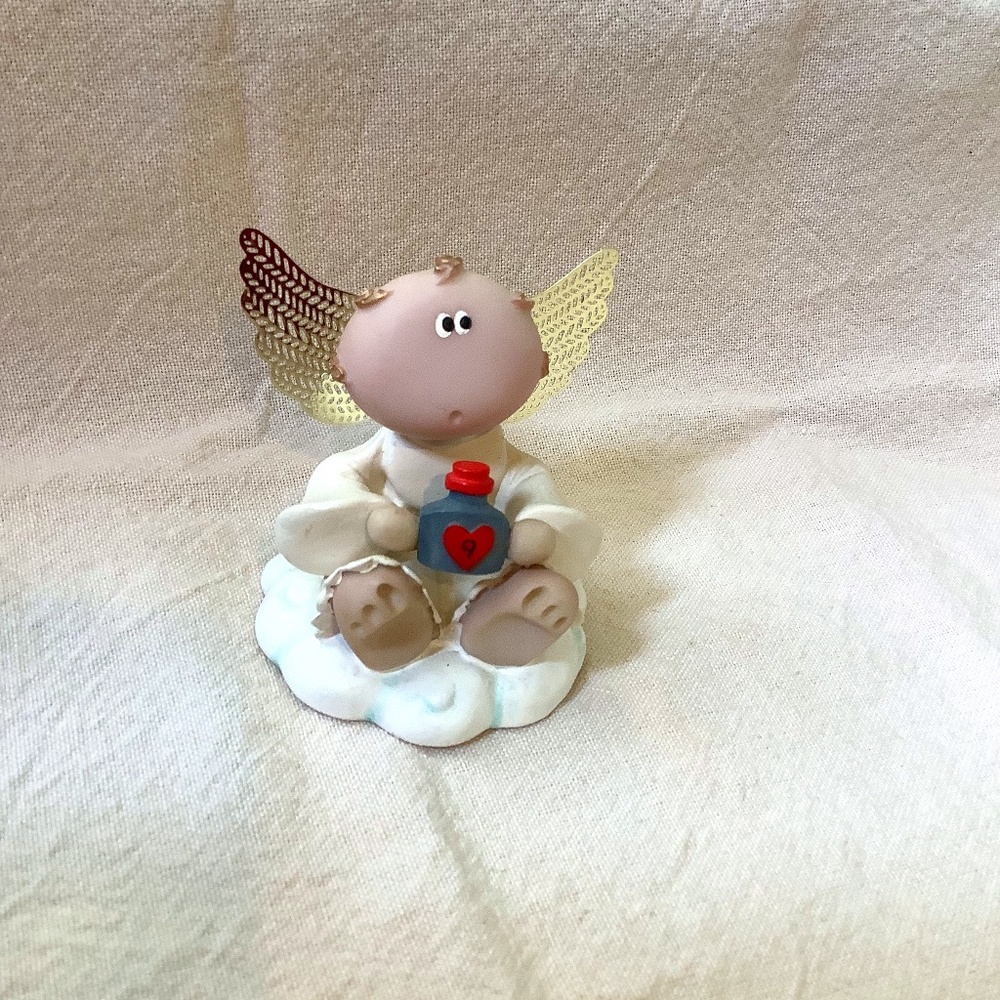Angel Cheeks Figurine